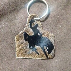 Rodeo cowboy keychain made out of real cow hide leather